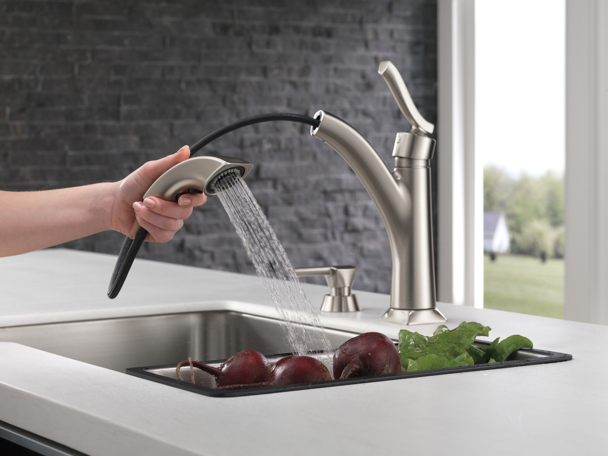 Single Handle Pull-Out Kitchen Faucet with Soap Dispenser in Spotshield  Stainless